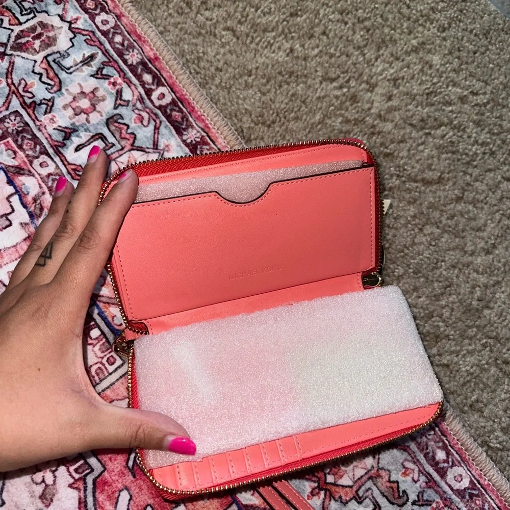 Hot pink Michael Kors wristlet